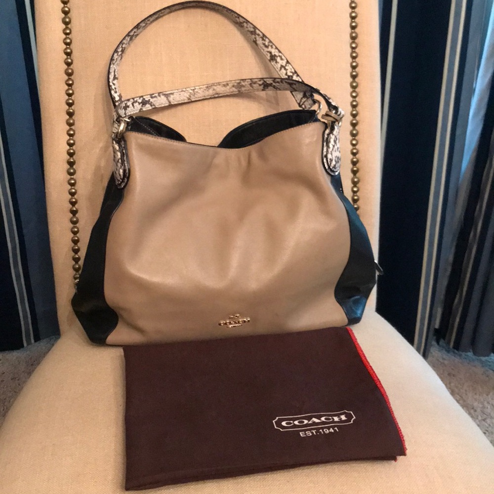 Coach like new leather tan-black  snake straps.